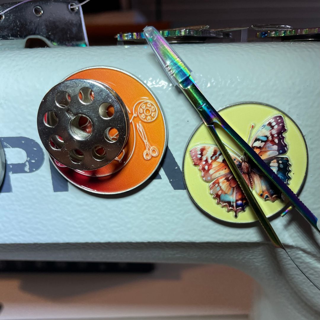 Magnets to sewing machine