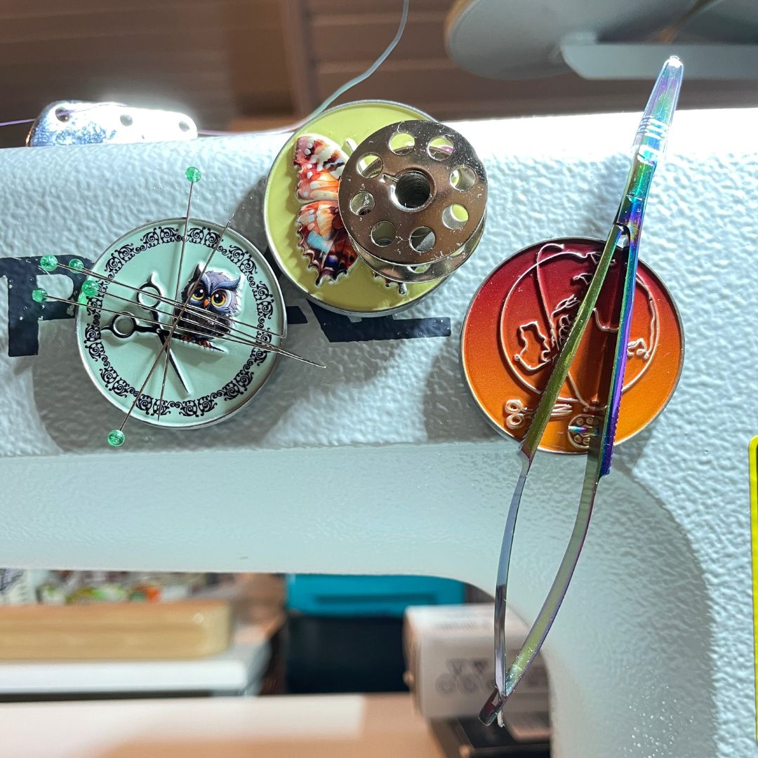 Magnets to sewing machine