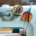 Magnets to sewing machine