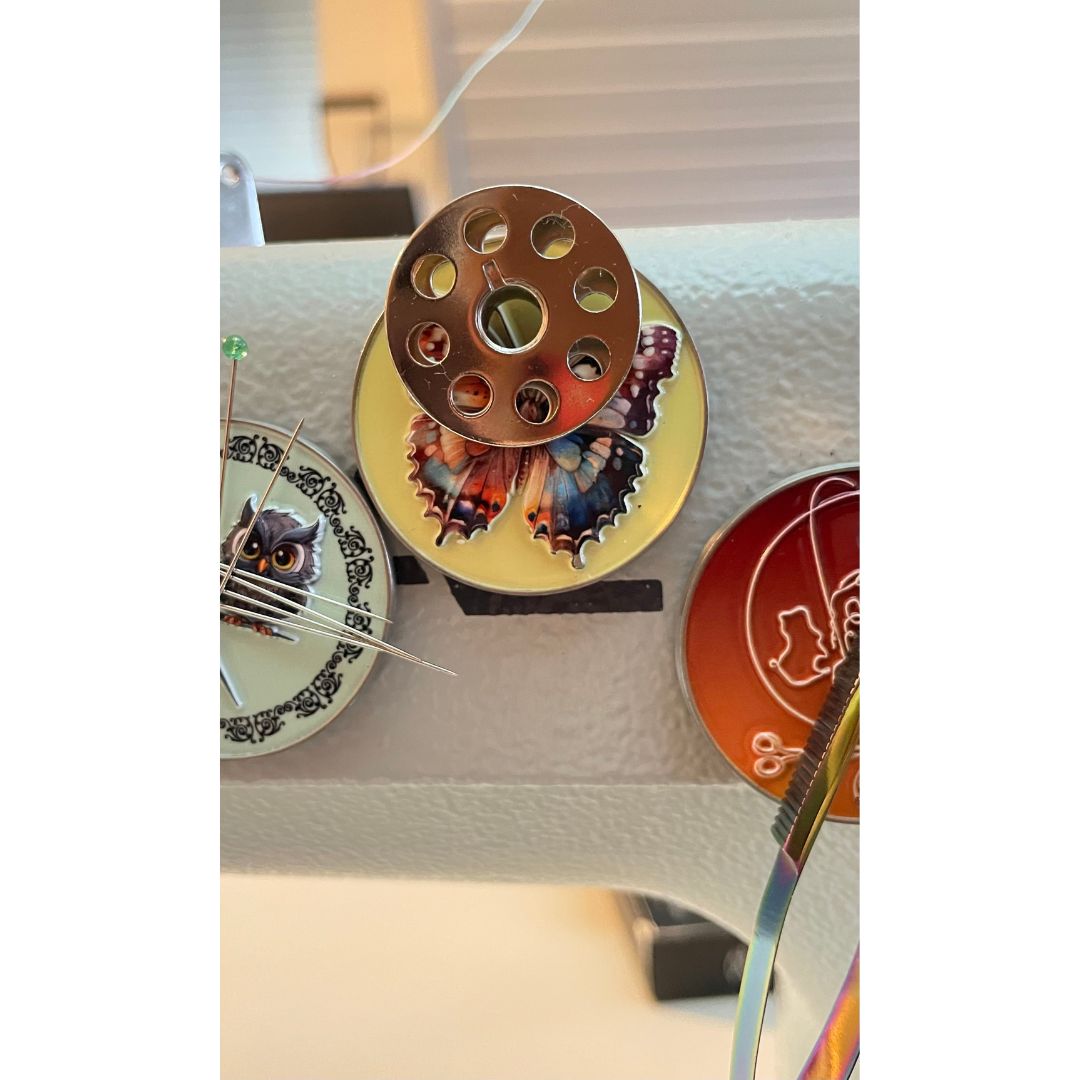 Magnets to sewing machine