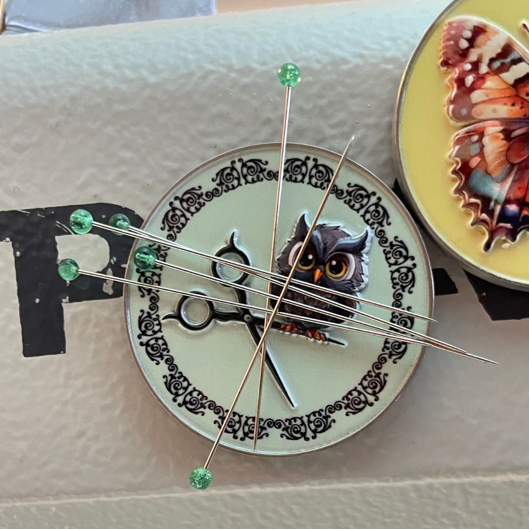 Magnets to sewing machine