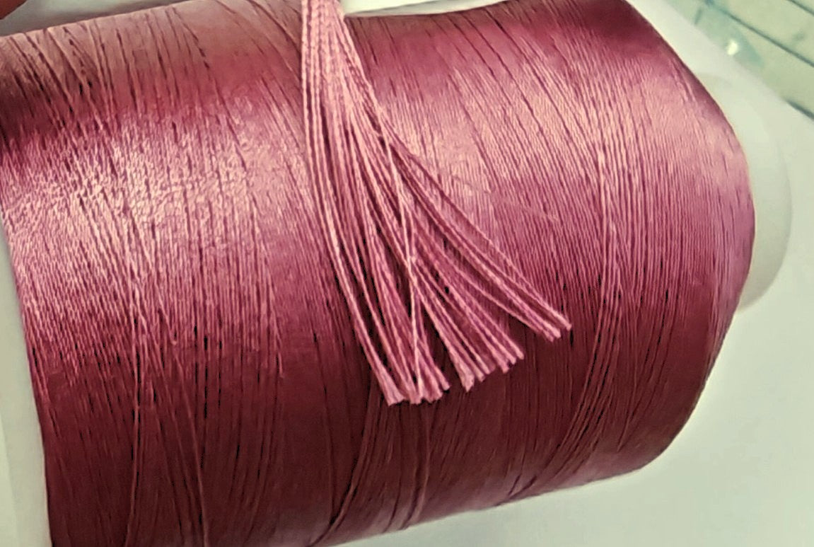 Bonded polyester thread in two thicknesses