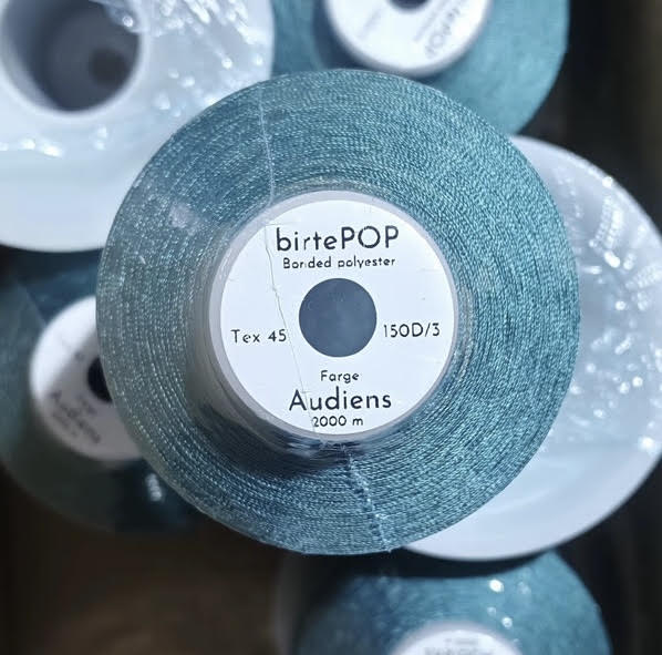 Bonded polyester thread in two thicknesses